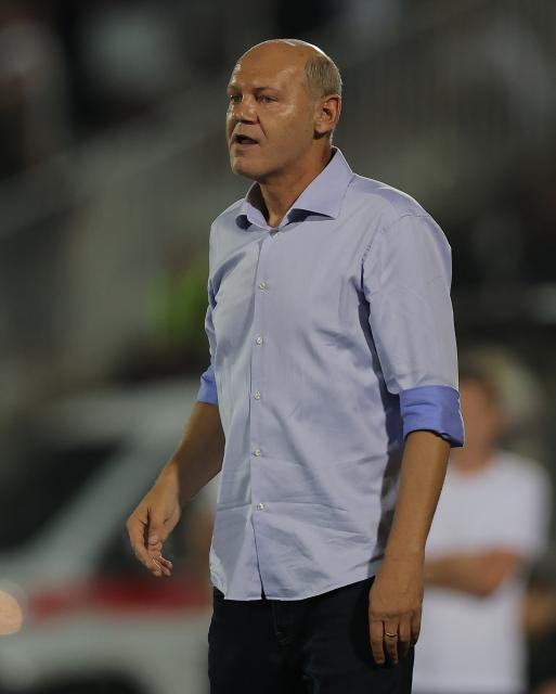 (260807) -- BELGRADE, Aug. 7, 2026 (Xinhua) -- Tobol's head coach Miroslav Romashchenko gestures during the third qualifying round 1st leg football match between Partizan and Tobol at the UEFA Conference League 2026/27 in Belgrade, Serbia on Aug. 6, 2026. (Photo by Predrag Milosavljevic/Xinhua)