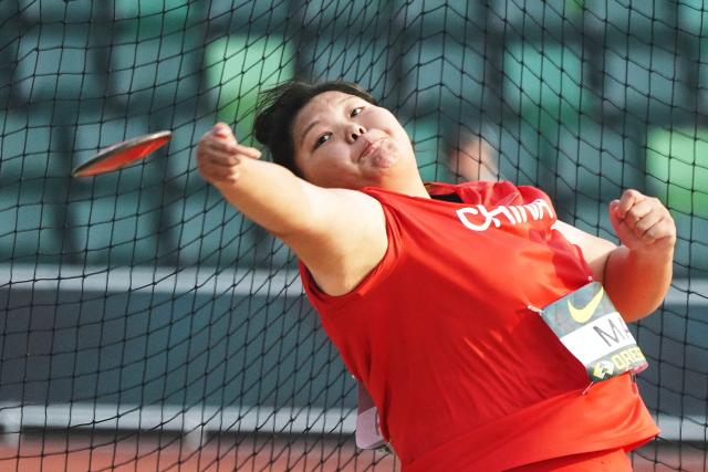 (260807) -- EUGENE, Aug. 7, 2026 (Xinhua) -- Ma Chenyi of China competes during the women's discus throw final at the 2026 World U20 Athletics Championships in Eugene, Oregon, the United States, Aug. 6, 2026. (Xinhua/Wu Xiaoling)