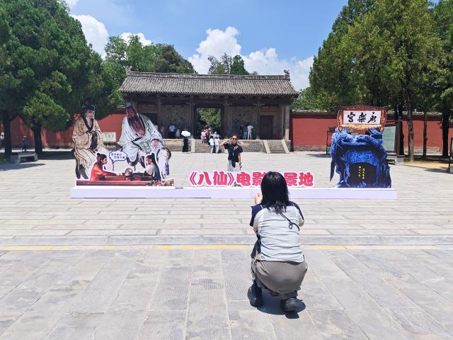 (260807) -- BEIJING, Aug. 7, 2026 (Xinhua) -- Tourists visit the Yongle Palace in Ruicheng County, north China's Shanxi Province, Aug. 7, 2026. (Photo by Quan Liuhuan/Xinhua)
