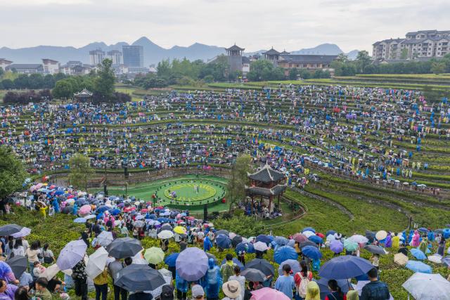 (260807) -- BIJIE, Aug. 7, 2026 (Xinhua) -- A drone photo taken on Aug. 7, 2026 shows a concert held on the terraced field in Shexiang ancient town of Dafang County in Bijie, southwest China's Guizhou Province. (Photo by Luo Dafu/Xinhua)