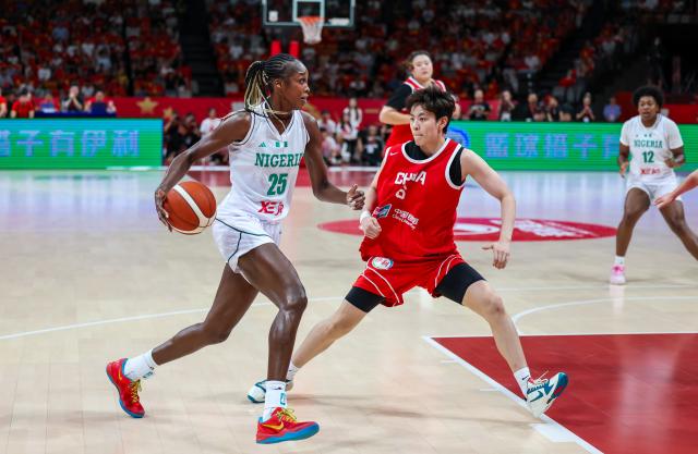 (260807) -- HAIKOU, Aug. 7, 2026 (Xinhua) -- Victoria Macaulay (L) of Nigeria competes during a friendly basketball match between China and Nigeria held in Haikou, south China's Hainan Province, Aug. 7, 2026. (Xinhua/Yang Guanyu)