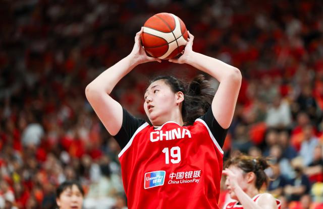 (260807) -- HAIKOU, Aug. 7, 2026 (Xinhua) -- Zhang Ziyu of China competes during a friendly basketball match between China and Nigeria held in Haikou, south China's Hainan Province, Aug. 7, 2026. (Xinhua/Yang Guanyu)