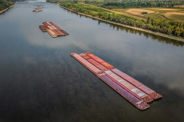 (260807) -- ZAGREB, Aug. 7, 2026 (Xinhua) -- This drone photo taken on Aug. 7, 2026 shows stranded cargo ships on the Danube river near Sarengrad, Croatia. Shipping on the Danube was severely affected by historically low water levels of the river. (David Jerkovic/PIXSELL via Xinhua)