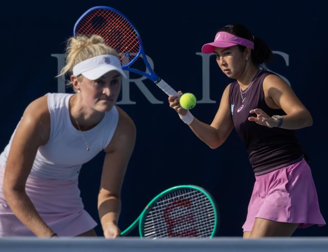 (260808) -- TORONTO, Aug. 8, 2026 (Xinhua) -- Erin Routliffe/Aldila Sutjiadi (R) compete during the first round of the women's doubles match between Guo Hanyu (China)/Kristina Mladenovic (France) and Erin Routliffe (New Zealand)/Aldila Sutjiadi (Indonesia) at the 2026 National Bank Open tennis tournament in Toronto, Canada, Aug. 7, 2026. (Photo by Zou Zheng/Xinhua)