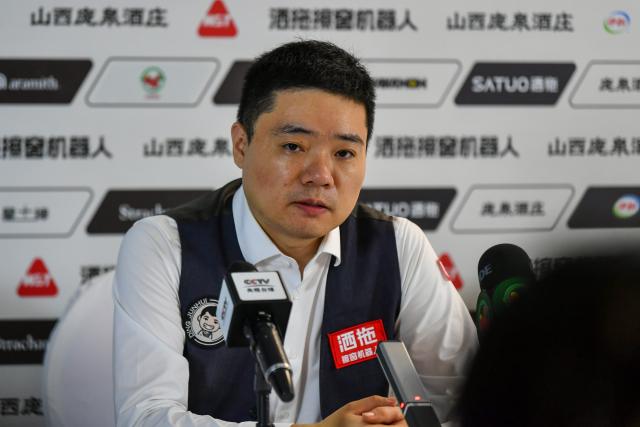 (260808) -- TAIYUAN, Aug. 8, 2026 (Xinhua) -- Ding Junhui of China is interviewed after the round 1 match between Ding Junhui of China and David Gilbert of England at China Open 2026 snooker tournament in Taiyuan, north China's Shanxi Province, Aug. 8, 2026. (Xinhua/Cao Yang)