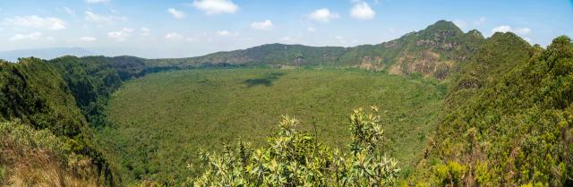 (260808) -- NAKURU, Aug. 8, 2026 (Xinhua) -- Combined photo taken on Aug. 8, 2026 shows a view of the volcanic crater at Mount Longonot National Park in Nakuru, Kenya. Mount Longonot National Park is located in Nakuru County in central Kenya, in the Great Rift Valley. Established in 1983, the park covers an area of about 52 square kilometers. Centered around the dormant Mount Longonot volcano, the park features a hiking trail around the volcanic crater and is a renowned destination in Kenya for its volcanic landscape and hiking. (Xinhua/Xie Jianfei)