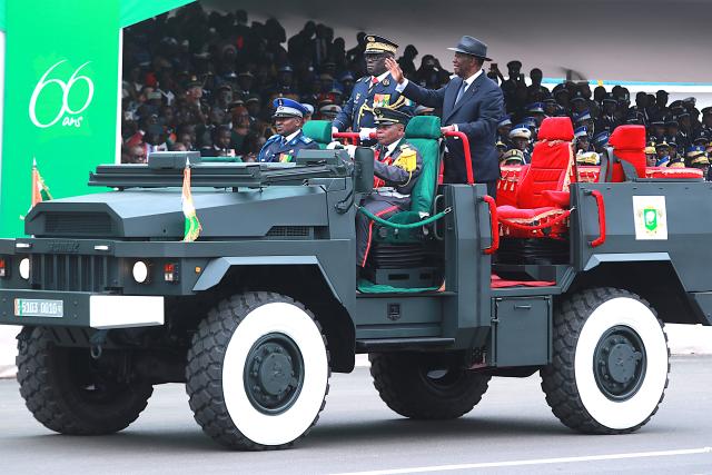 (260809) -- BEIJING, Aug. 9, 2026 (Xinhua) -- Ivorian President Alassane Ouattara (1st R) attends a military parade marking the 66th anniversary of Cote d'Ivoire's independence in Abidjan, Cote d'Ivoire, Aug. 7, 2026. A total of 5,423 personnel from Cote d'Ivoire's defense and security forces, together with military contingents from Benin, Guinea, Gabon and India, took part on Friday in a grand military parade on Boulevard de la Solidarite in the Yopougon commune of Abidjan, as part of the official celebrations marking the 66th anniversary of the country's independence. (Photo by Yvan Sonh/Xinhua)