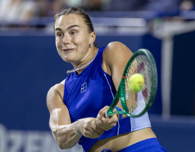 (260809) -- TORONTO, Aug. 9, 2026 (Xinhua) -- Aryna Sabalenka of Belarus returns the ball during the women's singles round of 16 match between Aryna Sabalenka of Belarus and Ekaterina Alexandrova of Russia at the 2026 National Bank Open tennis tournament in Toronto, Canada, Aug. 8, 2026. (Photo by Zou Zheng/Xinhua)
