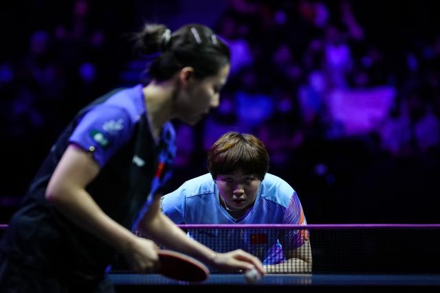 (260809) -- YOKOHAMA, Aug. 9, 2026 (Xinhua) -- Kuai Man (rear) of China reacts during the women's singles semifinal match between Chen Xingtong of China and Kuai Man of China at the WTT Champions Yokohama 2026 in Yokohama, Japan, Aug. 9, 2026. (Xinhua/Jia Haocheng)