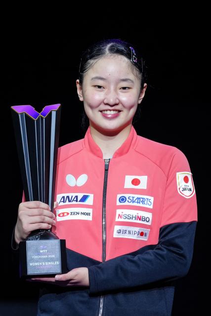(260809) -- YOKOHAMA, Aug. 9, 2026 (Xinhua) -- Harimoto Miwa of Japan reacts during the awarding ceremony after the women's singles final match between Harimoto Miwa of Japan and Chen Xingtong of China at the WTT Champions Yokohama 2026 in Yokohama, Japan, Aug. 9, 2026. (Xinhua/Jia Haocheng)