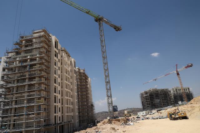 (260809) -- JERUSALEM, Aug. 9, 2026 (Xinhua) -- This photo taken on Aug. 9, 2026 shows an Israeli settlement under construction in the West Bank, near Jerusalem. In recent years, Israel's continued approval of settlement expansions in the region has drawn widespread criticism from the international community. (Photo by Gil Cohen Magen/Xinhua)