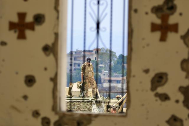 (260809) -- ZAWTAR AL-GHARBIYAH, Aug. 9, 2026 (Xinhua) -- A Lebanese soldier is seen on duty following an Israeli advance into Zawtar al-Gharbiyah and the establishment of a sand barrier near a Lebanese Army position, in Zawtar al-Gharbiyah, southern Lebanon, Aug. 8, 2026. (Photo by Ali Hashisho/Xinhua)