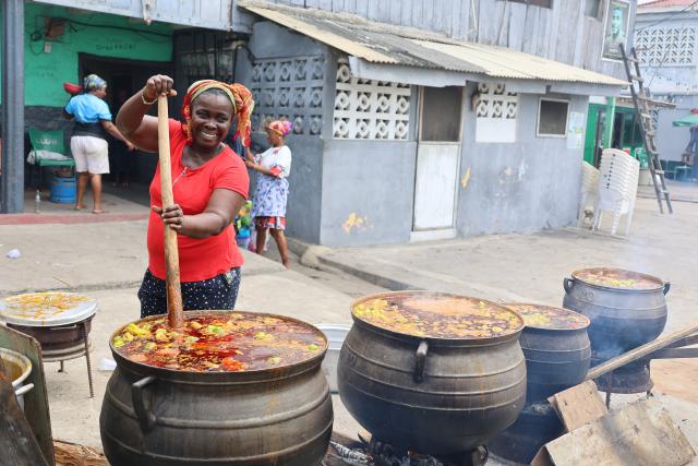 (260809) -- ACCRA, Aug. 9, 2026 (Xinhua) -- A woman prepares palm nut soup to celebrate Homowo festival in Accra, Ghana, Aug. 8, 2026. People of Ghana's Ga ethnic group celebrated the annual Homowo festival in the capital Accra on Saturday, showcasing a vibrant blend of traditional rituals, music, costumes, and communal festivities. (Photo by Seth/Xinhua)