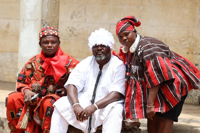 (260809) -- ACCRA, Aug. 9, 2026 (Xinhua) -- People in traditional clothes pose for photos during celebration of Homowo festival in Accra, Ghana, Aug. 8, 2026. People of Ghana's Ga ethnic group celebrated the annual Homowo festival in the capital Accra on Saturday, showcasing a vibrant blend of traditional rituals, music, costumes, and communal festivities. (Photo by Seth/Xinhua)