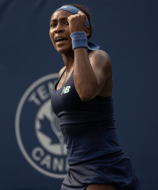 (260810) -- TORONTO, Aug. 10, 2026 (Xinhua) -- Coco Gauff of the United States celebrates scoring during the women's singles round of 16 match between Alina Korneeva of Russia and Coco Gauff of the United States at the 2026 National Bank Open tennis tournament in Toronto, Canada, on Aug. 9, 2026. (Photo by Zou Zheng/Xinhua)