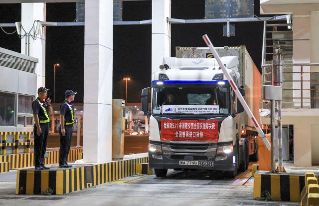 (260810) -- NAIROBI, Aug. 10, 2026 (Xinhua) -- A container truck, transporting the first batch of imports under China's expanded zero-tariff treatment to 53 African nations, enters Shenzhenwan Port in Shenzhen, south China's Guangdong Province, May 1, 2026. (Xinhua/Mao Siqian)