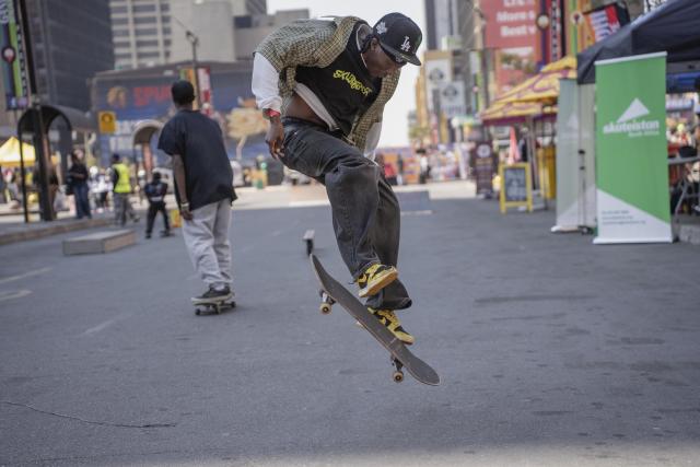 (260810) -- JOHANNESBURG, Aug. 10, 2026 (Xinhua) -- A man skateboards on a street during a car-free event in Johannesburg, South Africa, Aug. 9, 2026. During the event, some streets in Johannesburg were turned into car-free zones from 10 a.m. to 5 p.m., with motor vehicles banned. (Photo by Ihsaan Haffejee/Xinhua)