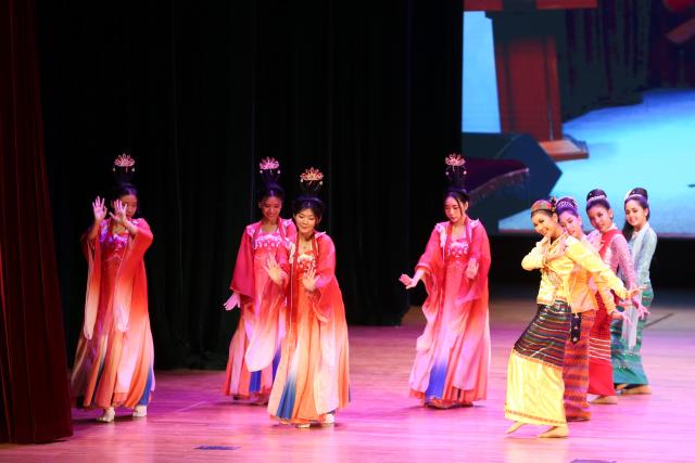 (260810) -- YANGON, Aug. 10, 2026 (Xinhua) -- Dancers perform during the opening ceremony of the "Weekly Cinema, Shared Stories" Film Exhibition at the National Theater in Yangon, Myanmar, Aug. 9, 2026. TO GO WITH "Asia-Pacific Community: Chinese space documentary inspires Myanmar students" (Xinhua/Myo Kyaw Soe)