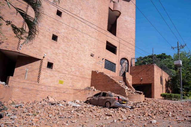 (260810) -- CALI, Aug. 10, 2026 (Xinhua) -- Photo taken on Aug. 10, 2026 shows a damaged car after an earthquake in Cali, Colombia. Colombia declared a state of national disaster on Monday after a magnitude 7.4 earthquake struck the country's west earlier in the day and killed more than 70 people nationwide. (Str/Xinhua)