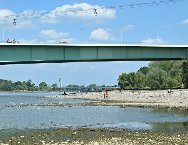 (260810) -- COLOGNE, Aug. 10, 2026 (Xinhua) -- The Rhine River is pictured in Cologne, Germany, Aug. 10, 2026. Persistent drought has caused water levels to fall along several sections of the Rhine River in Germany. (Photo by Ulrich Hufnagel/Xinhua)