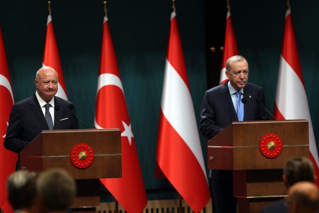 (260811) -- ANKARA, Aug. 11, 2026 (Xinhua) -- Turkish President Recep Tayyip Erdogan (R) holds a joint press conference with visiting Austrian Chancellor Christian Stocker in Ankara, Türkiye, on Aug.10, 2026. Turkish President Recep Tayyip Erdogan and visiting Austrian Chancellor Christian Stocker highlighted great potential in bilateral cooperation during a live-streamed joint press conference here on Monday. (Mustafa Kaya/Handout via Xinhua)