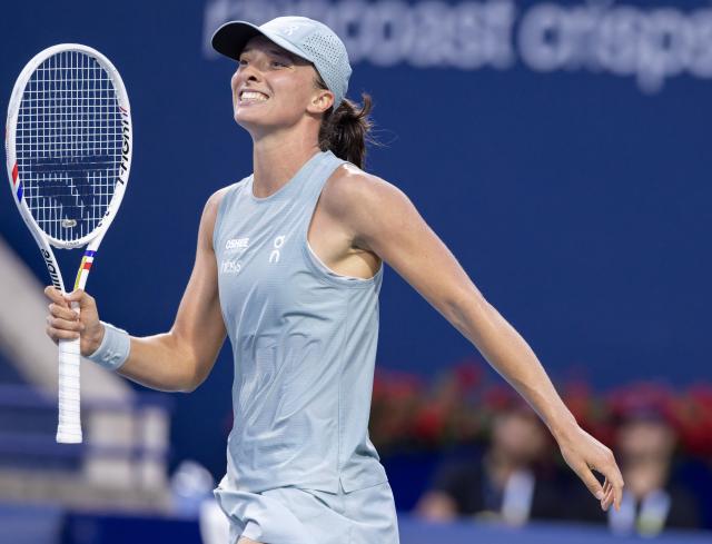 (260811) -- TORONTO, Aug. 11, 2026 (Xinhua) -- Iga Swiatek of Poland reacts during the women's singles quarterfinal match between Diana Shnaider of Russia and Iga Swiatek of Poland at the 2026 National Bank Open tennis tournament in Toronto, Canada, on Aug. 10, 2026. (Photo by Zou Zheng/Xinhua)