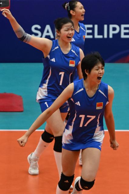 (260811) -- SAN FELIPE, Aug. 11, 2026 (Xinhua) -- Niu Sidi (Front) and Chen Xinyi (C) of China celebrate during the Pool B Preliminary Phase match between China and Mexico at the FIVB Volleyball Girls' U17 World Championship in San Felipe, Chile, Aug. 10, 2026. (Photo by Jorge Villegas/Xinhua)