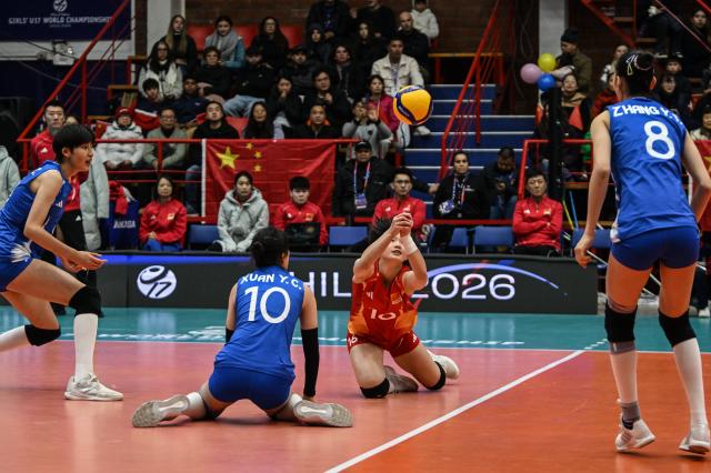 (260811) -- SAN FELIPE, Aug. 11, 2026 (Xinhua) -- Chen Qien (2nd R) of China competes during the Pool B Preliminary Phase match between China and Mexico at the FIVB Volleyball Girls' U17 World Championship in San Felipe, Chile, Aug. 10, 2026. (Photo by Jorge Villegas/Xinhua)