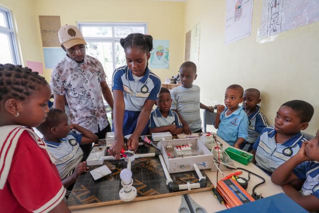 (260811) -- DAR ES SALAAM, Aug. 11, 2026 (Xinhua) -- Students learn basic electrical skills during a practical skills class at De'kayra Pre and Primary School in Bagamoyo, Tanzania, Aug. 7, 2026. TO GO WITH "Feature: Learning by doing prepares Tanzanian children for future" (Xinhua/Emmanuel Herman)