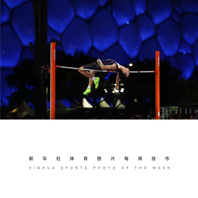 (260811) -- BEIJING, Aug. 11, 2026 (Xinhua) -- XINHUA SPORTS PHOTO OF THE WEEK (from Aug. 3 to Aug. 9, 2026) TRANSMITTED on Aug. 11, 2026. He Yifan of Jiangsu competes during the men's high jump competition of China Athletics Street Tour (CAST) in front of the National Aquatics Center in Beijing, capital of China, Aug. 8, 2026. (Xinhua/Li Ming)
