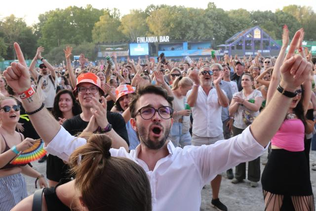 (260811) -- BUDAPEST, Aug. 11, 2026 (Xinhua) -- People enjoy performances during the 2026 Sziget Festival in Budapest, Hungary, Aug. 10, 2026. The event officially opened to the public on Tuesday on Budapest's Obuda Island, bringing together music, arts and cultural programs from Hungary and abroad.
   Running until Aug. 15, this year's festival provided around 12 themed districts offering music, contemporary arts, circus performances, sports, family and community programs. (Photo by Attila Volgyi/Xinhua)
