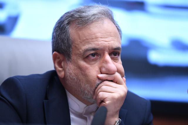 (260811) -- TEHRAN, Aug. 11, 2026 (Xinhua) -- Iran's Foreign Minister Seyed Abbas Araghchi attends a ceremony where Iran's Foreign Ministry and Health Ministry sign a memorandum of understanding (MoU) on cooperation in rebuilding infrastructure damaged during the war in Tehran, Iran, Aug. 11, 2026. Araghchi said on Tuesday that meeting the country's healthcare needs was among the most challenging tasks undertaken by his ministry during the 40-day war with the United States and Israel. (Xinhua/Shadati)