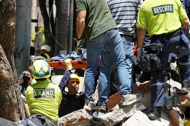 (260812) -- CALI, Aug. 12, 2026 (Xinhua) -- Rescuers conduct search and rescue operation on the ruins of a building damaged in an earthquake in Cali, Colombia, Aug. 11, 2026. The death toll from Monday's 7.4-magnitude earthquake in western Colombia has risen to 188, with 1,677 others injured, the Colombian Association of Capital Cities, or Asocapitales, said Tuesday.
    Asocapitales said it has launched a system to report and search for missing persons as rescue and damage assessment work continues. (COLPRENSA/Handout via Xinhua)
