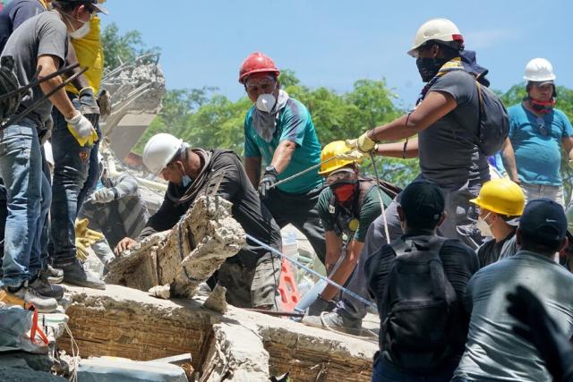 (260812) -- CALI, Aug. 12, 2026 (Xinhua) -- Rescuers conduct search and rescue operation on the ruins of a building damaged in an earthquake in Cali, Colombia, Aug. 11, 2026. The death toll from Monday's 7.4-magnitude earthquake in western Colombia has risen to 188, with 1,677 others injured, the Colombian Association of Capital Cities, or Asocapitales, said Tuesday.
    Asocapitales said it has launched a system to report and search for missing persons as rescue and damage assessment work continues. (COLPRENSA/Handout via Xinhua)