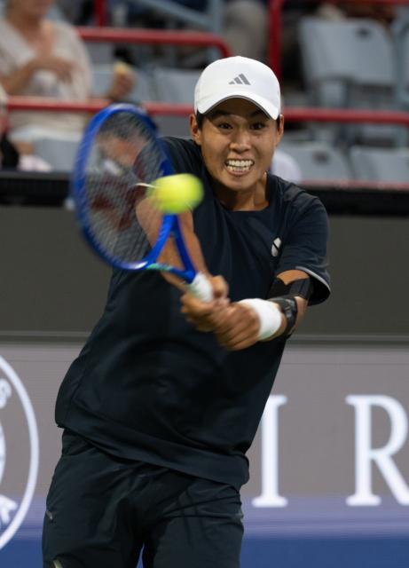 (260812) -- MONTREAL, Aug. 12, 2026 (Xinhua) -- Learner Tien of the United States competes during the men's singles quarterfinal match between Learner Tien of the United States and Daniel Merida of Spain at the 2026 National Bank Open tennis tournament in Montreal, Canada, Aug. 11, 2026. (Photo by Li Haitao/Xinhua)