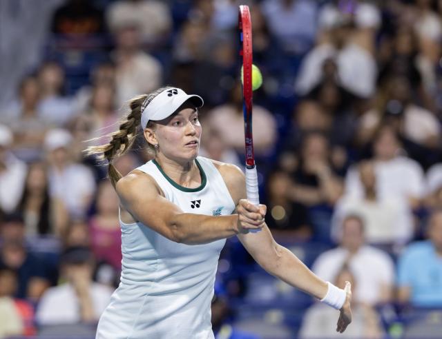 (260812) -- TORONTO, Aug. 12, 2026 (Xinhua) -- Elena Rybakina of Kazakhstan returns the ball during the women's singles quarterfinal match between Naomi Osaka of Japan and Elena Rybakina of Kazakhstan at the 2026 National Bank Open tennis tournament in Toronto, Canada, on Aug. 11, 2026. (Photo by Zou Zheng/Xinhua)