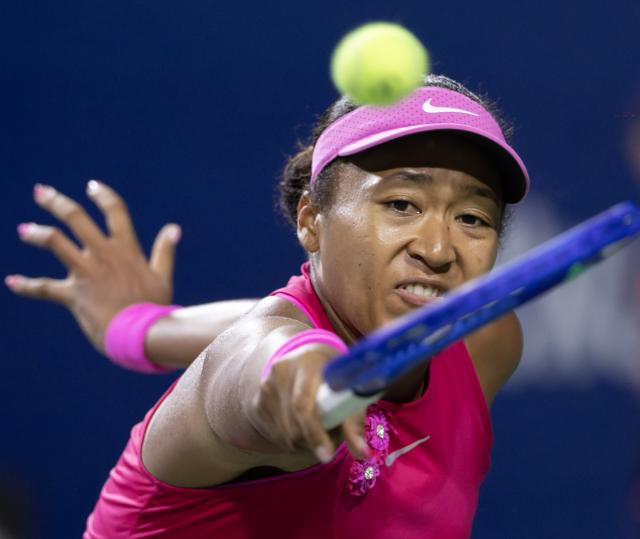 (260812) -- TORONTO, Aug. 12, 2026 (Xinhua) -- Naomi Osaka of Japan returns the ball during the women's singles quarterfinal match between Naomi Osaka of Japan and Elena Rybakina of Kazakhstan at the 2026 National Bank Open tennis tournament in Toronto, Canada, on Aug. 11, 2026. (Photo by Zou Zheng/Xinhua)