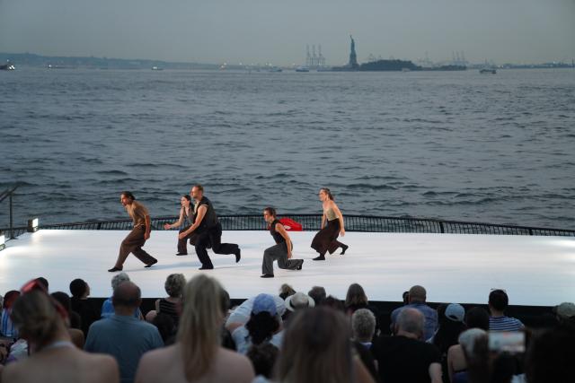 (260812) -- NEW YORK, Aug. 12, 2026 (Xinhua) -- Dancers perform during the Battery Dance Festival at the Battery Park of Manhattan in New York, the United States, On Aug. 11, 2026. The 45th annual Battery Dance Festival kicked off at an outdoor stage with New York Harbor in the background here on Tuesday. (Xinhua/Zhang Fengguo)