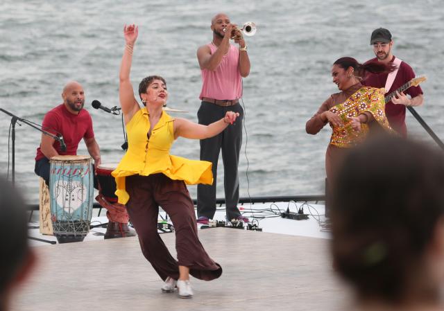(260812) -- NEW YORK, Aug. 12, 2026 (Xinhua) -- Dancers perform during the Battery Dance Festival at the Battery Park of Manhattan in New York, the United States, On Aug. 11, 2026. The 45th annual Battery Dance Festival kicked off at an outdoor stage with New York Harbor in the background here on Tuesday. (Xinhua/Zhang Fengguo)