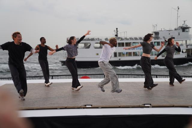 (260812) -- NEW YORK, Aug. 12, 2026 (Xinhua) -- Dancers perform during the Battery Dance Festival at the Battery Park of Manhattan in New York, the United States, On Aug. 11, 2026. The 45th annual Battery Dance Festival kicked off at an outdoor stage with New York Harbor in the background here on Tuesday. (Xinhua/Zhang Fengguo)