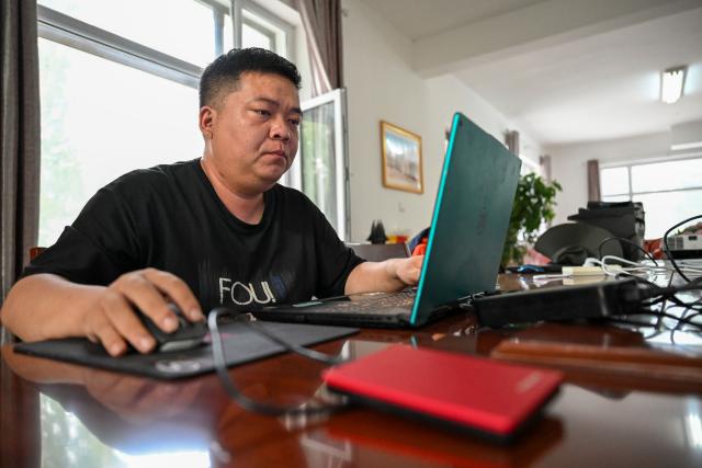 (260812) -- URUMQI, Aug. 12, 2026 (Xinhua) -- A researcher sorts out collected data at the Altay Mountains comprehensive observation and research station in Jeminay County in Altay, northwest China's Xinjiang Uygur Autonomous Region, Aug. 11, 2026. In recent days, a scientific expedition to the Muz Taw Glacier in Altay was carried out by a research team from the Altay Mountains comprehensive observation and research station, in an effort to better understand the glacier's response to climate change and provide scientific data for glacier protection and water resources management in the region. 
The team, affiliated with the Northwest Institute of Eco-Environment and Resources under the Chinese Academy of Sciences (CAS), conducted field observations at an altitude of 3,400 meters on the glacier, and systematically collected key data on meteorology, hydrology and glacier changes. (Xinhua/Ding Lei)