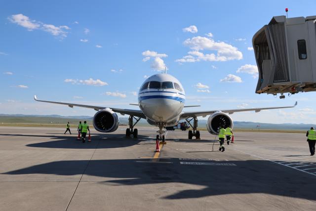 (260812) -- ULAN BATOR, Aug. 12, 2026 (Xinhua) -- China's homegrown C919 large passenger aircraft lands at the new Ulan Bator airport in Mongolia, Aug. 12, 2026. China's homegrown C919 large passenger aircraft landed safely at the new Ulan Bator airport in Mongolia on Wednesday afternoon after departing from Beijing Capital International Airport, marking the completion of the aircraft's first scheduled international commercial passenger flight.
   This is the first international route opened after the C919 entered commercial operation, marking the official transition of China's domestically developed mainline passenger aircraft into a new phase of regular international operations. (Xinhua/Bolortsetseg)