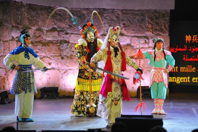 (260812) -- TUNIS, Aug. 12, 2026 (Xinhua) -- Artists of the China National Peking Opera Company perform at the ancient theatre of Carthage in Tunis, Tunisia, Aug. 11, 2026. The China National Peking Opera Company presented a performance on Tuesday at the "Folklores of the World" event during the 60th Carthage Festival in Tunis. (Photo by Adel Ezzine/Xinhua)