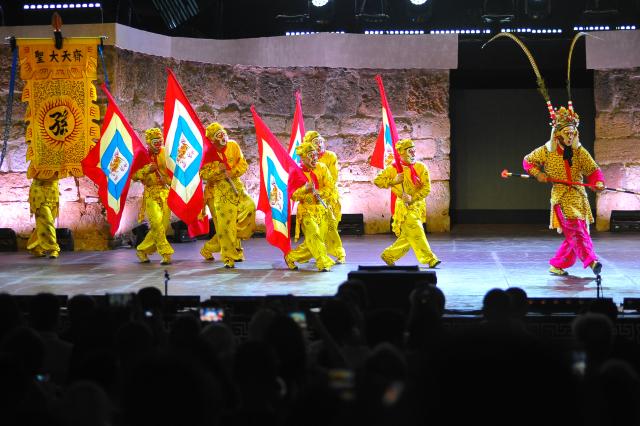 (260812) -- TUNIS, Aug. 12, 2026 (Xinhua) -- Artists of the China National Peking Opera Company perform at the ancient theatre of Carthage in Tunis, Tunisia, Aug. 11, 2026. The China National Peking Opera Company presented a performance on Tuesday at the "Folklores of the World" event during the 60th Carthage Festival in Tunis. (Photo by Adel Ezzine/Xinhua)