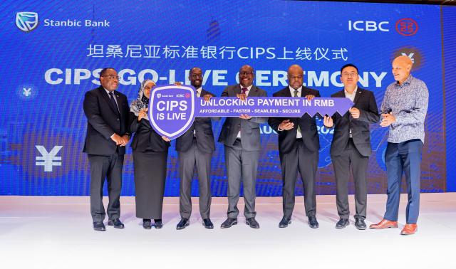 (260812) -- DAR ES SALAAM, Aug. 12, 2026 (Xinhua) -- Guests celebrate the launch of Stanbic Bank Tanzania's direct RMB settlement service in Dar es Salaam, Tanzania, Aug. 12, 2026. Stanbic Bank Tanzania, one of Tanzania's leading commercial banks, on Wednesday launched a direct renminbi (RMB) settlement service, allowing Tanzanian businesses trading with China to make and receive payments directly in the Chinese currency, a move expected to reduce transaction costs and facilitate bilateral trade.
TO GO WITH "Tanzania introduces direct RMB settlement service to facilitate trade with China" (Xinhua/Nurdin Pallangyo)