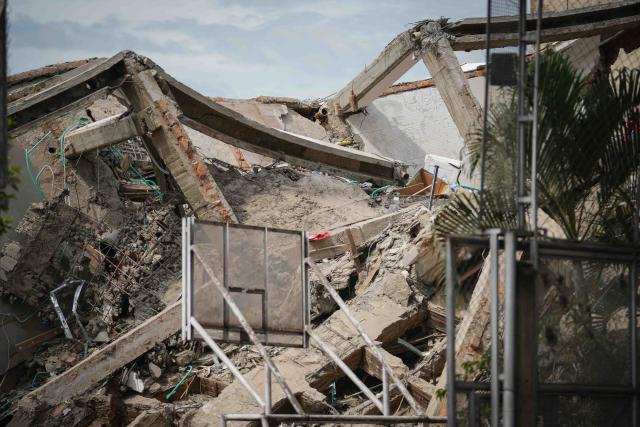 (260812) -- CALI, Aug. 12, 2026 (Xinhua) -- This photo taken on Aug. 12, 2026 shows a collapsed building in an earthquake in Cali, Colombia. The death toll from Monday's 7.4-magnitude earthquake in western Colombia has risen to 241, with 3,771 others injured, Colombian media reported Wednesday, citing figures from the National Unit for Disaster Risk Management. (Photo by Andres Moreno/Xinhua)