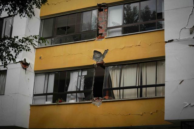 (260812) -- CALI, Aug. 12, 2026 (Xinhua) -- This photo taken on Aug. 12, 2026 shows a damaged building in an earthquake in Cali, Colombia. The death toll from Monday's 7.4-magnitude earthquake in western Colombia has risen to 241, with 3,771 others injured, Colombian media reported Wednesday, citing figures from the National Unit for Disaster Risk Management. (Photo by Andres Moreno/Xinhua)