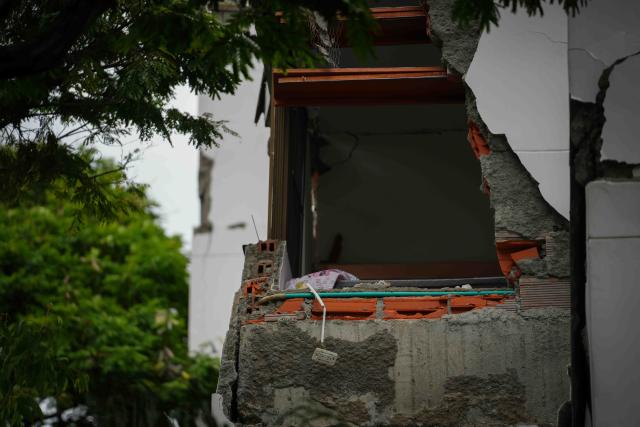(260812) -- CALI, Aug. 12, 2026 (Xinhua) -- This photo taken on Aug. 12, 2026 shows a damaged building in an earthquake in Cali, Colombia. The death toll from Monday's 7.4-magnitude earthquake in western Colombia has risen to 241, with 3,771 others injured, Colombian media reported Wednesday, citing figures from the National Unit for Disaster Risk Management. (Photo by Andres Moreno/Xinhua)