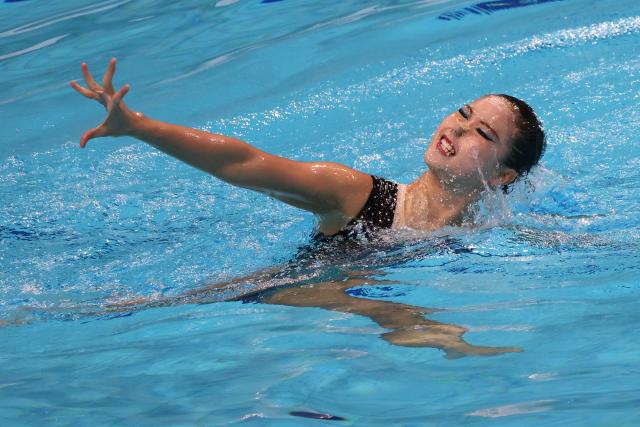 (260813) -- BUDPAEST, Aug. 13, 2026 (Xinhua) -- He Zhien of China performs during the Women's Solo Technical Final of the World Aquatics Junior Artistic Swimming Championships in Budapest, Hungary, on Aug. 12, 2026. (Photo by Attila Volgyi/Xinhua)
