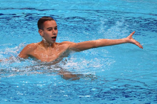 (260813) -- BUDPAEST, Aug. 13, 2026 (Xinhua) -- Eneko Sanchez Aguilar of Spain performs during the Men's Solo Technical Final of the World Aquatics Junior Artistic Swimming Championships in Budapest, Hungary, on Aug. 12, 2026. (Photo by Attila Volgyi/Xinhua)
